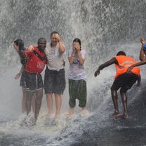 Under the waterfall