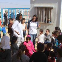 Students interacting with local children in Jordan.