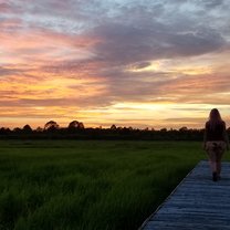 Watching the sunset on the bamboo deck