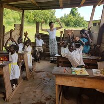Volunteer teaching in one of our linked schools