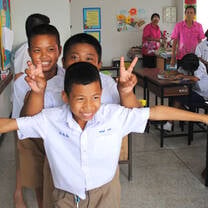 Volunteer with children in Cambodia