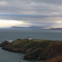 Sunlight breaks over the coastal town of Howth