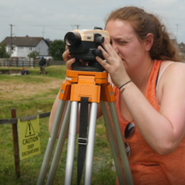 Intern out In the field surveying Learn international