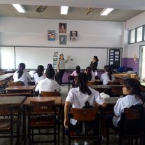 Nayley teaching with thai school