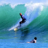 person surfing catching a big wave