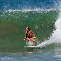 person surfing catching a wave