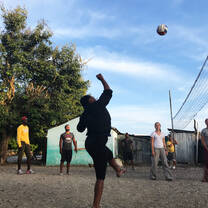 Playing volleyball