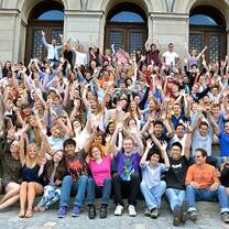 group of people in front of school