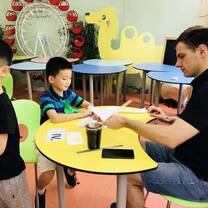 Working one on one with students in China