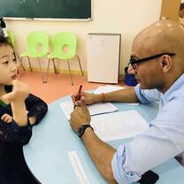 Teacher getting to know his students