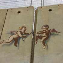 A favorite image from the trip: baby angels tearing down the concreted separation wall in Bethlehem