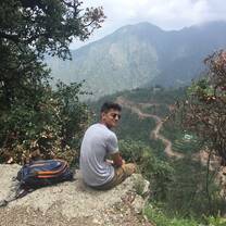 Volunteer taking in the view at adventure camp in Dhanaulti, Mussoorie, India with The Tarzan Way