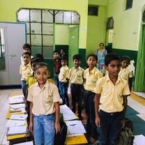 Children in school getting ready of session by volunteer in Rishikesh, India with The Tarzan Way