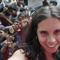 Volunteer from Portugal posing with children with The Tarzan Way