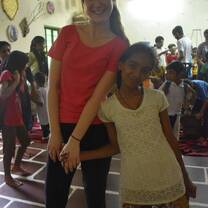 Volunteer from Italy posing with children in Jaipur, India with The Tarzan Way