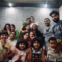 Volunteers posing with children after work in Jaipur, India with The Tarzan Way