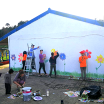Painting a mural at a local school
