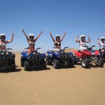 Explore the Namibian sand dunes with friends.