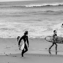 Surfers in action