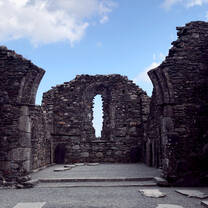 The Seven Churches of Glendalough in County Wicklow. This is a photo of the Cathedral nested in the monastic city, inside a small cupboard was built to house treasured vessel and other materials used for mass.