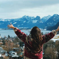 girl looking out over the mountains