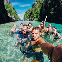 group in the water in El Nido Island