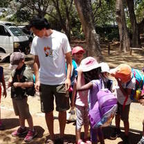 intern with school children