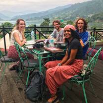 This picture was taken in Pokhara, a city 200 km from Kathmandu. I was with a girl from ireland, a guy from New zealand, another guy from USA and other guy from Canada. 40 minutes after we took this picture another 10 volunteers joined us at this amazing rooftop. 