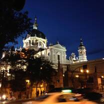 Beautiful building lit up in the night. 