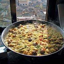 Large bowl of good near a window. 