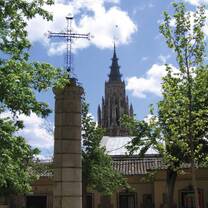 Trees with a tower in the distance. 