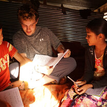 Volunteer teaching private English lesson