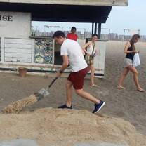 man shoveling dirt