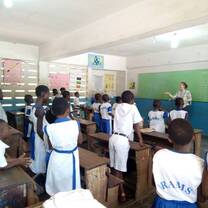 teacher teaching group in classroom