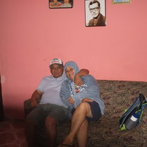 My host parents wearing the gifts I brought them :)