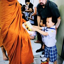 My students are encouraged to participate in donating food to the monks in our province.