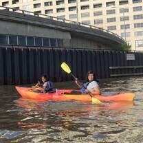 Sage Corps Chicago cohort kayaking on the Chicago River.