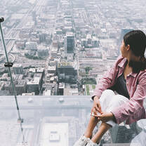 Sage Corps Chicago cohort enjoying their views at the Willis Tower.