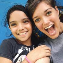 female volunteer and child