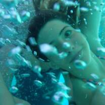 An underwater photo of a young person 