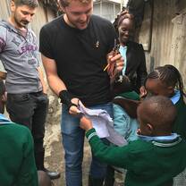 Volunteers teaching pre-school and primary school children.