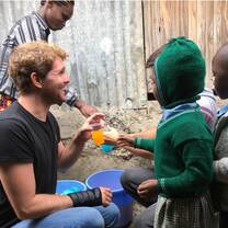 Volunteers having fun with kids