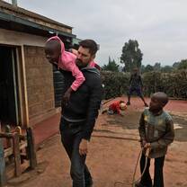 Volunteers having fun with kids.