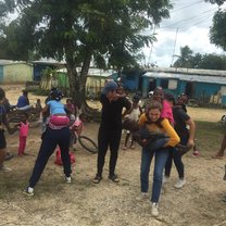 Playing with kids at health clinics
