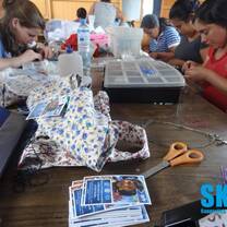The mom's hard at work in the Women's artisan program