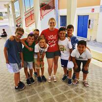 Camp counselor with students 