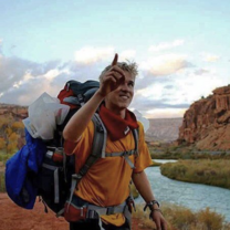 Exploring canyons man with backpack exploring canyons