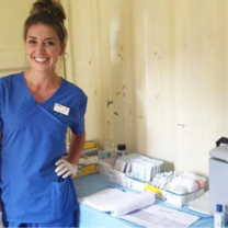 Medical Intern in front of supply table