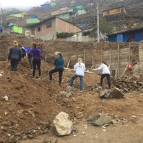 Students participating in a service project outside of Lima during orientation as part of the introduction to Peruvian social reality Service Project - Study Abroad EdOdyssey
