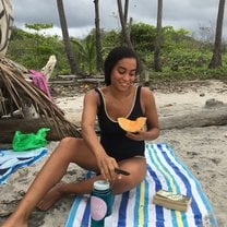 This is me living my best life, eating fresh fruit in Santa Theresa.